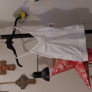 Super cute white tank top with pockets